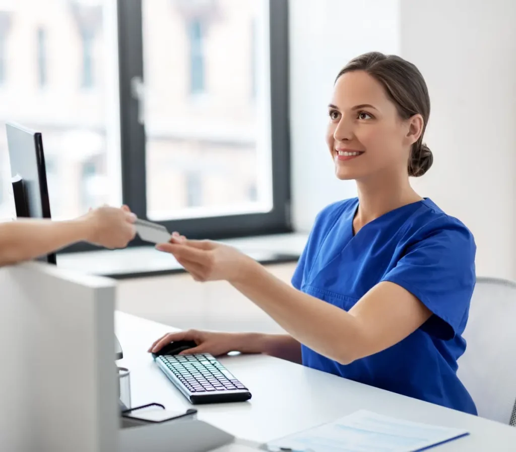 nurse and patient with credit card card