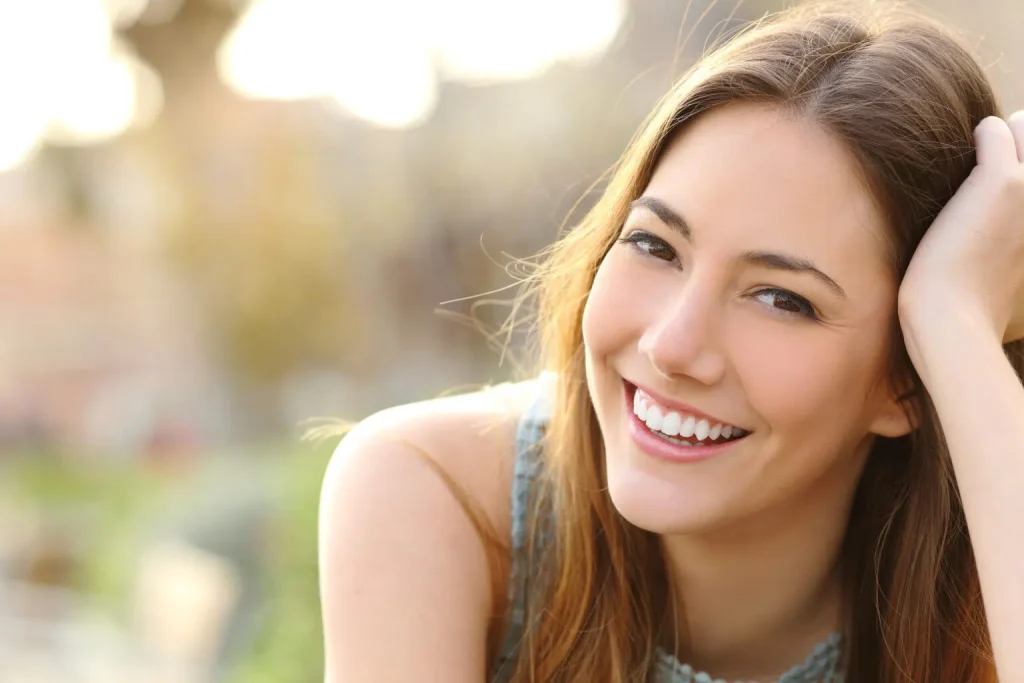 young woman smiling at the camera