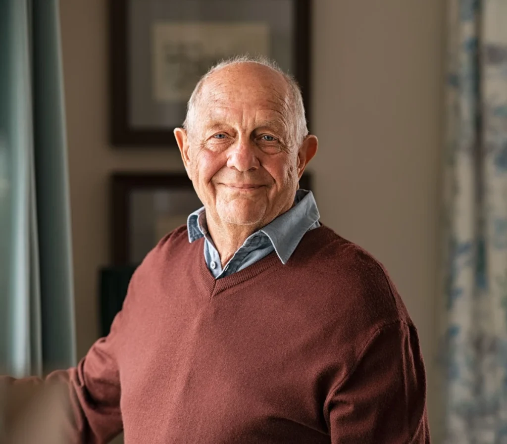 portrait of senior man in his home