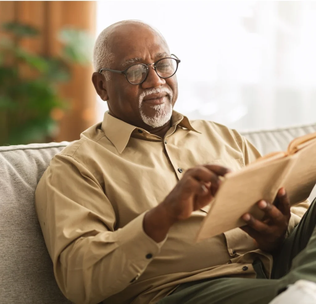 senior man reading a book